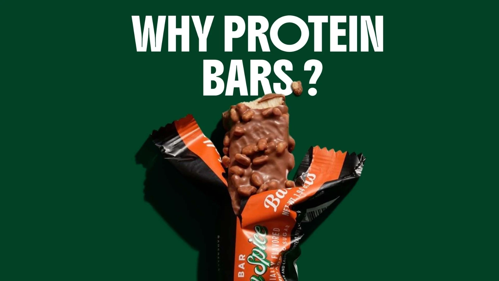 Chocolate-coated protein bar with nuts shown alongside its wrapper, illustrating a convenient high-protein snack.